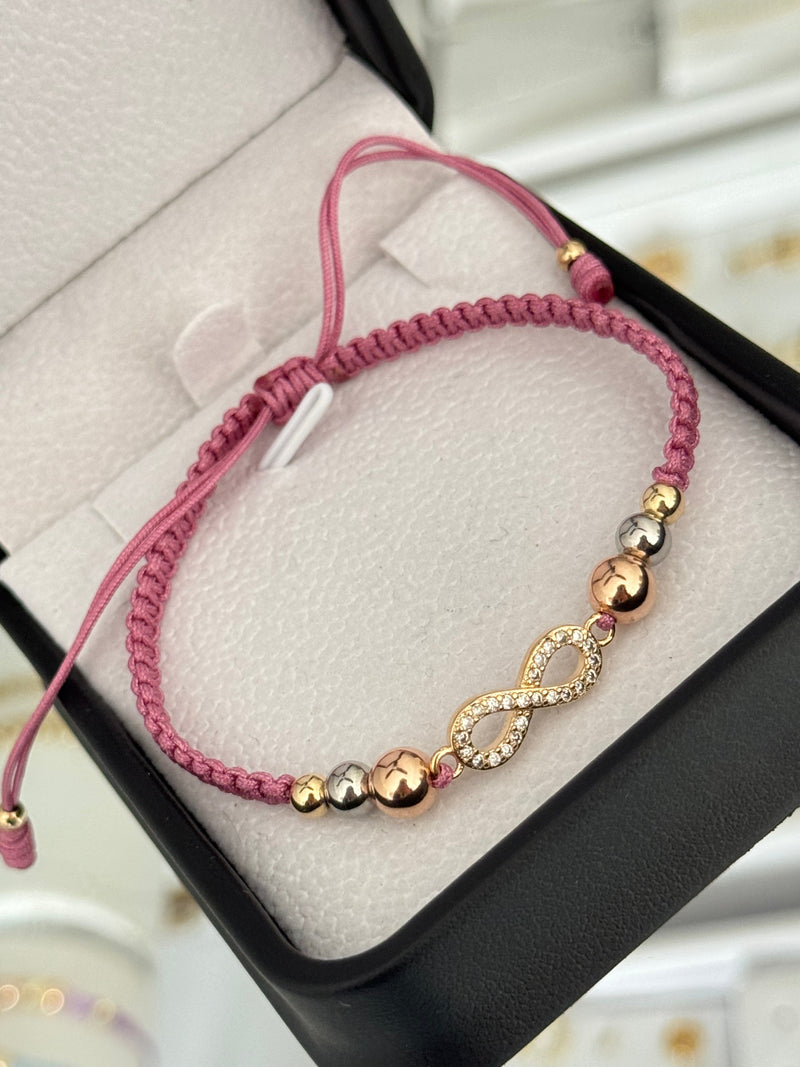 Pulsera infinito circonias. N° de Balín: #6 rosa, #5 acero, #4.
