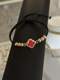 Pulsera trébol rojo