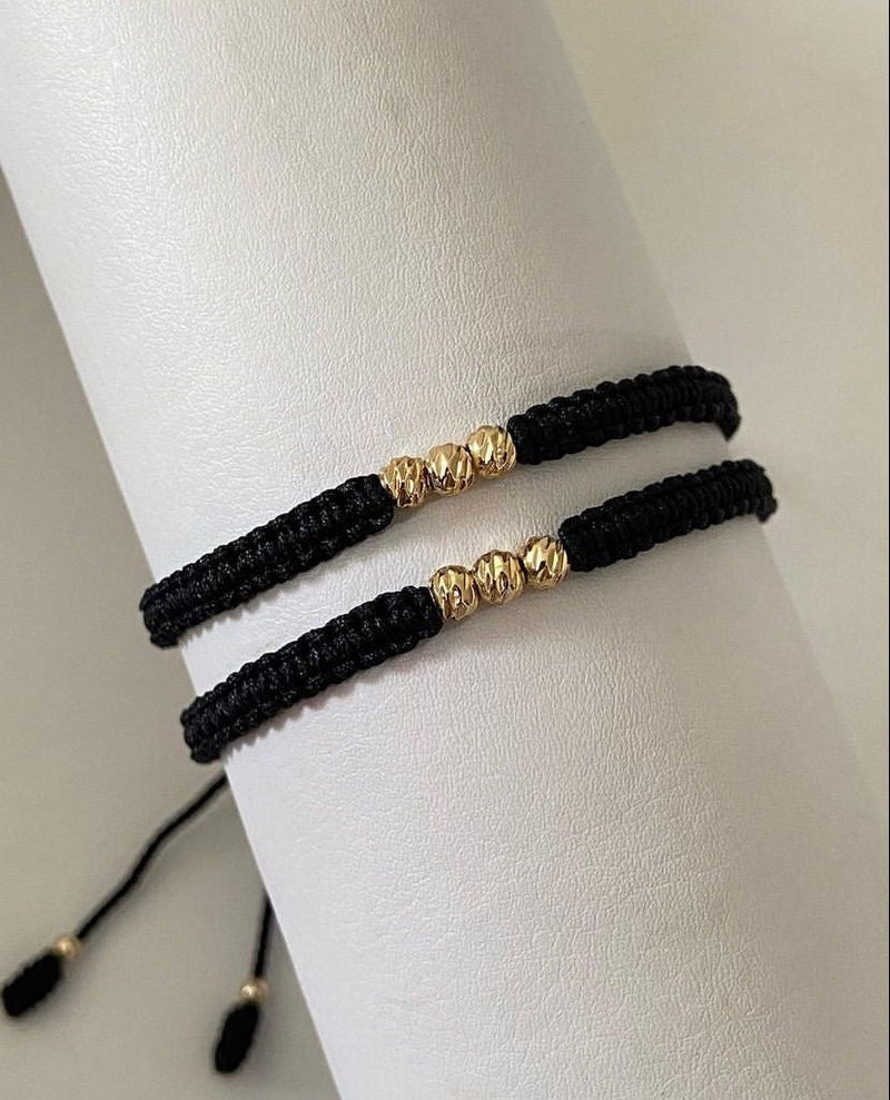 Juego pulsera con balines #4 diamantados. X2 negro